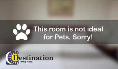 a sign that says this room is not ideal for pets at Destination Family Hotel in Whitehorse