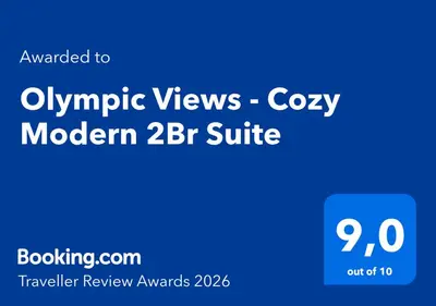 a blue sign with the words olympic views cozy modern br suite at Olympic Views - Cozy Modern 2Br Suite in Victoria