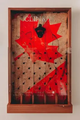 a painting of a red tree on a wall at The Fjall Ski-In Ski-Out Village Studio in Big White