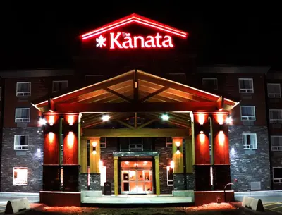 a hotel with a sign that reads kaminaria at Kanata Whitecourt in Whitecourt