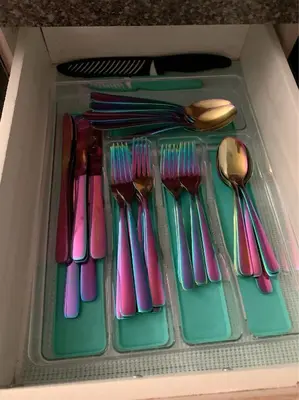 a drawer filled with plastic utensils and spoons at Cozy Basement Suite close to Downtown,Edmonton in Edmonton