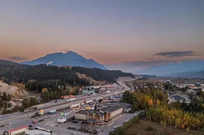 an aerial view of a city with a mountain at Holiday Inn Express Golden-Kicking Horse by IHG in Golden