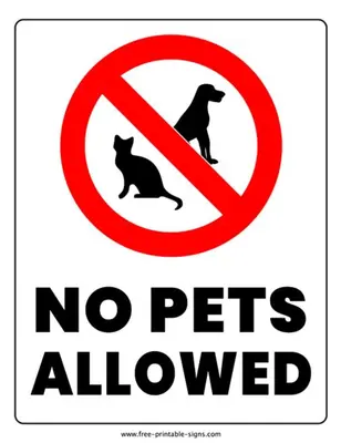a sign that says no pets allowed with a dog in it at Robbie's Motel in Cache Creek