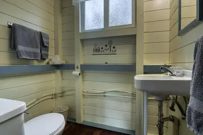 a bathroom with a toilet and a sink at Timbers Resort in Fairmont Hot Springs