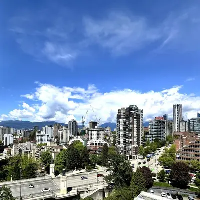 a view of a city with tall buildings at Stunning ocean (sound of waves) in Vancouver