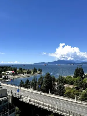 a view of a bridge over a body of water at Stunning ocean (sound of waves) in Vancouver