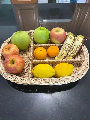 a basket filled with apples and oranges and apples and lemons at Private suite 1 bed 1 bath 15 mins YVR and downtown \u8212\u9002\u5b89\u9759 in Vancouver