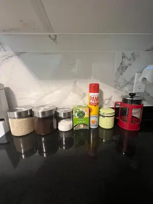 a counter with different types of ingrediants in a kitchen at Private suite 1 bed 1 bath 15 mins YVR and downtown \u8212\u9002\u5b89\u9759 in Vancouver