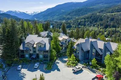 an aerial view of a home with mountains in the background at Powderview 12 by Whistler Premier in Whistler
