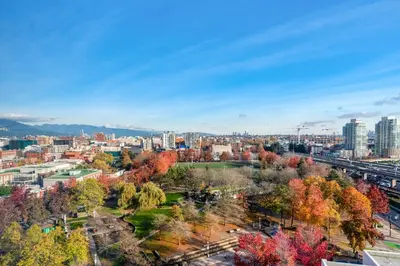 an autumn view of a city with buildings at Downtown 1 Bedroom Water View Condo in Vancouver