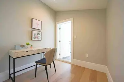 a home office with a desk and a chair at Four bedrooms New Lovely Duplex House-1628 in Vancouver