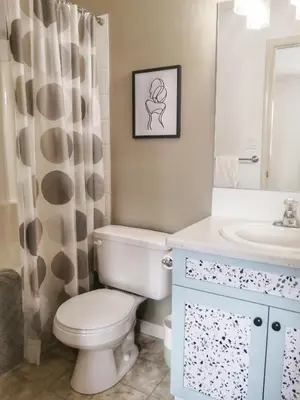 a bathroom with a toilet and a sink at Bright 3 bed 3 bath House in Radium Hot Springs in Radium Hot Springs