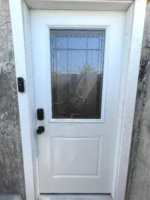 a white door with a window on it at Cozy 3 beds Suite Near Calgary Airport Sleeps 6 in Calgary