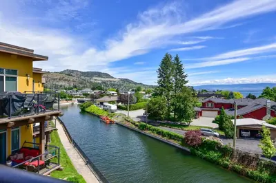 a view of a river in a town at Lakeside Luxe Haven in West Kelowna