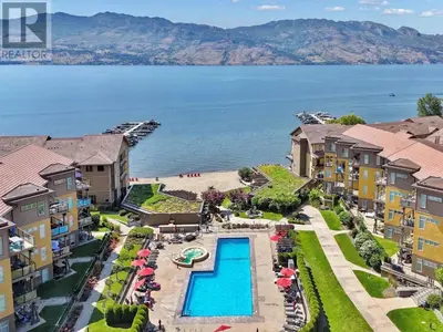 an aerial view of a resort with a swimming pool at Lakeside Luxe Haven in West Kelowna