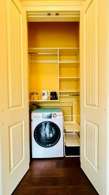 a washer and dryer in a small room at Quiet Room in Richmond in Richmond