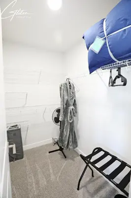 a hospital room with a bed and a blanket at Beautiful Home With 4 King Beds,Airport,Disney+ in Edmonton