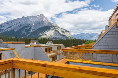 a balcony with a view of a mountain at Hotel Canoe and Suites in Banff
