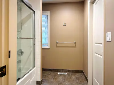 a bathroom with a shower and a glass door at Scorpio House Langley- ROOM 3 in Langley