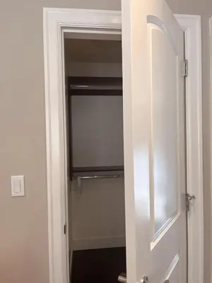 an open door to a closet with a shower at Near Skytrain and QUIET Private Bedroom Ensuite BathRM, Free Wifi & Coffee, Cozy in Burnaby