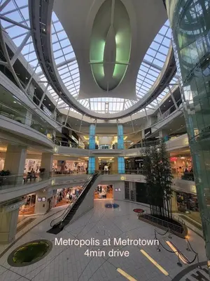 a large shopping mall with a large ceiling at Near Skytrain and QUIET Private Bedroom Ensuite BathRM, Free Wifi & Coffee, Cozy in Burnaby