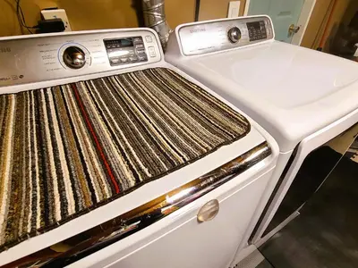 a white stove top oven sitting in a kitchen at Woodcrest Bed and Breakfast in Clearwater
