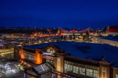 a view of a city at night at Luxury Apartment on the 9th Floor near Stampede, Complimentary Wine, 2 Car UG Parking in Calgary