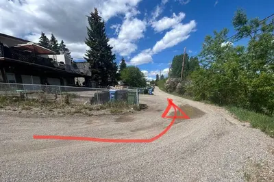 a road with an orange arrow on the side of it at Forth Street 2Bedroom Suite in Calgary