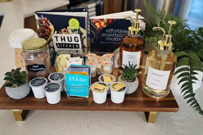 a wooden table with a bunch of products on it at Downtown 5 Bedroom, AC, Rogers, Commonwealth, EXPO in Edmonton