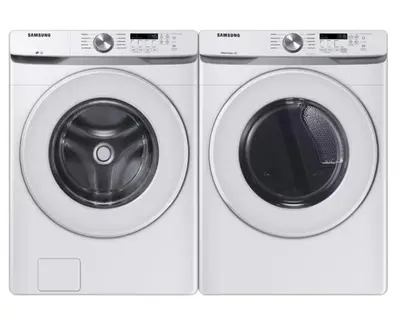 two washing machines are standing next to each other at W116 NEW! Central Canmore- Whimsical Mountain Retreat in Canmore