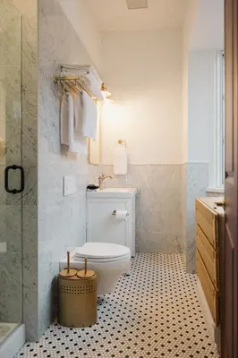 a bathroom with a toilet and a sink at Hotel Morado in Chilliwack