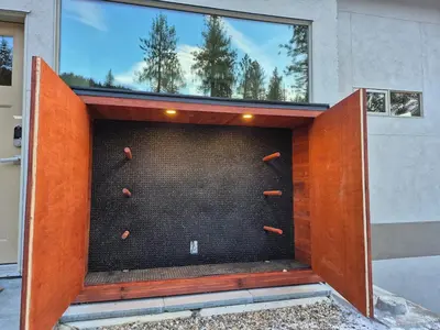 a wall with baseball equipment inside of a building at Five Star-Amazing views and Hot Tub in Crescent Valley