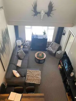an overhead view of a living room with a couch at The Eden Whistler - Luxury 2 BDRM Ski in / Ski out in Whistler