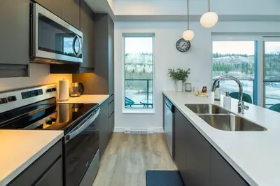 a kitchen with a sink and a counter top at NN - The Current 2 - Downtown 1-Bed 1-Bath in Whitehorse