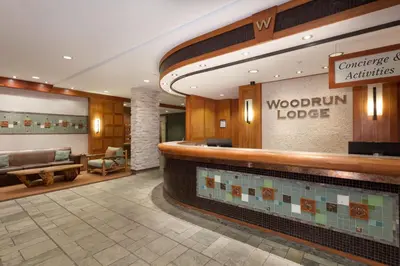 a lobby of a woodington lodge at Woodrun Lodge 517 | Large Ski-In Ski-Out Condo by Upper Village w/ Mountain Views & Shared Hot Tub in Whistler