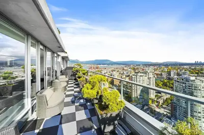 a balcony with a view of a city at Skyline Hideaway in Vancouver