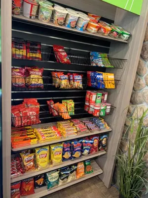 a refrigerator filled with lots of different types of food at Cascade Lodge with front desk check in services, ski valet service, boot and glove dryer, 2 hot tubs, year round heated pool, gym, sauna, change rooms & showers, WIFI, cable TV in Whistler