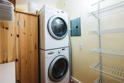 a washer and dryer in a laundry room at The Niven Lake Retreat in Yellowknife