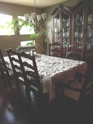 a dining room with a table and chairs and a table and chairsktop at Whitehorse Wonder in Whitehorse