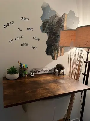a desk with writing on the wall at Cozy Haven! in Edmonton