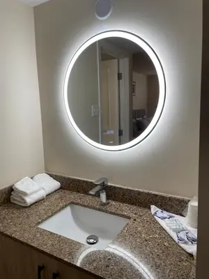 a bathroom with a sink and a mirror at The 22 Hotel in Cremona