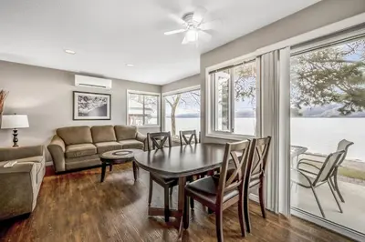 a living room with a table and chairs and a couch at The Perfect Getaway Cabin in the Okanagan #6 in West Kelowna