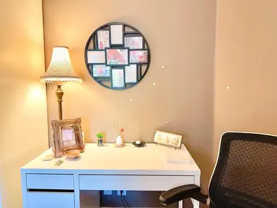 a room with a desk with a lamp and a mirror at Scorpio House Langley -ROOM 1 Separate restroom in Pitt Meadows