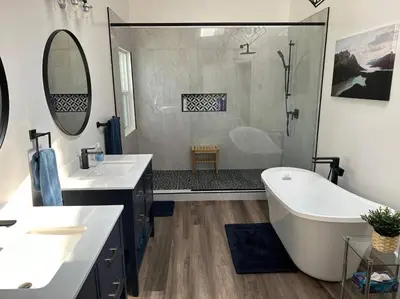 a bathroom with two sinks and a tub and a shower at Verde Vista - Steam Shower - Theatre - Ping-Pong in Fairmont Hot Springs