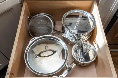 a box filled with pots and pans at Stylish Euro Vibes Home, Small Gym, AC, Yard, Office in Edmonton
