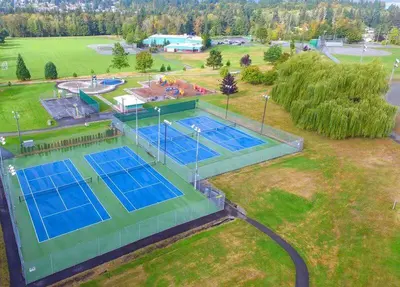 an overhead view of two tennis courts on a field at Yellow Door Suite in Campbell River