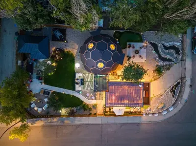 an overhead view of a building with a pool at Dome House YYC, Iconic, Luxury, Backyard Oasis in Calgary
