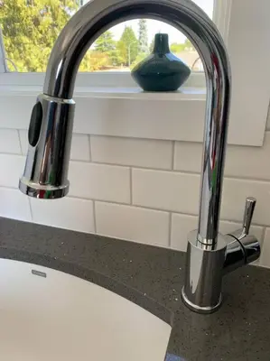 a kitchen sink with a faucet on a counter at Location, Location, Location-Immaculate 1 Bedroom Suite in Victoria