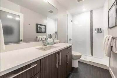 a bathroom with a sink and a toilet and a shower at Cityzen Sanctuary in Victoria