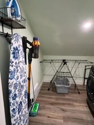 a room with skis and a snowboard in a room at Wellington House in Nanaimo